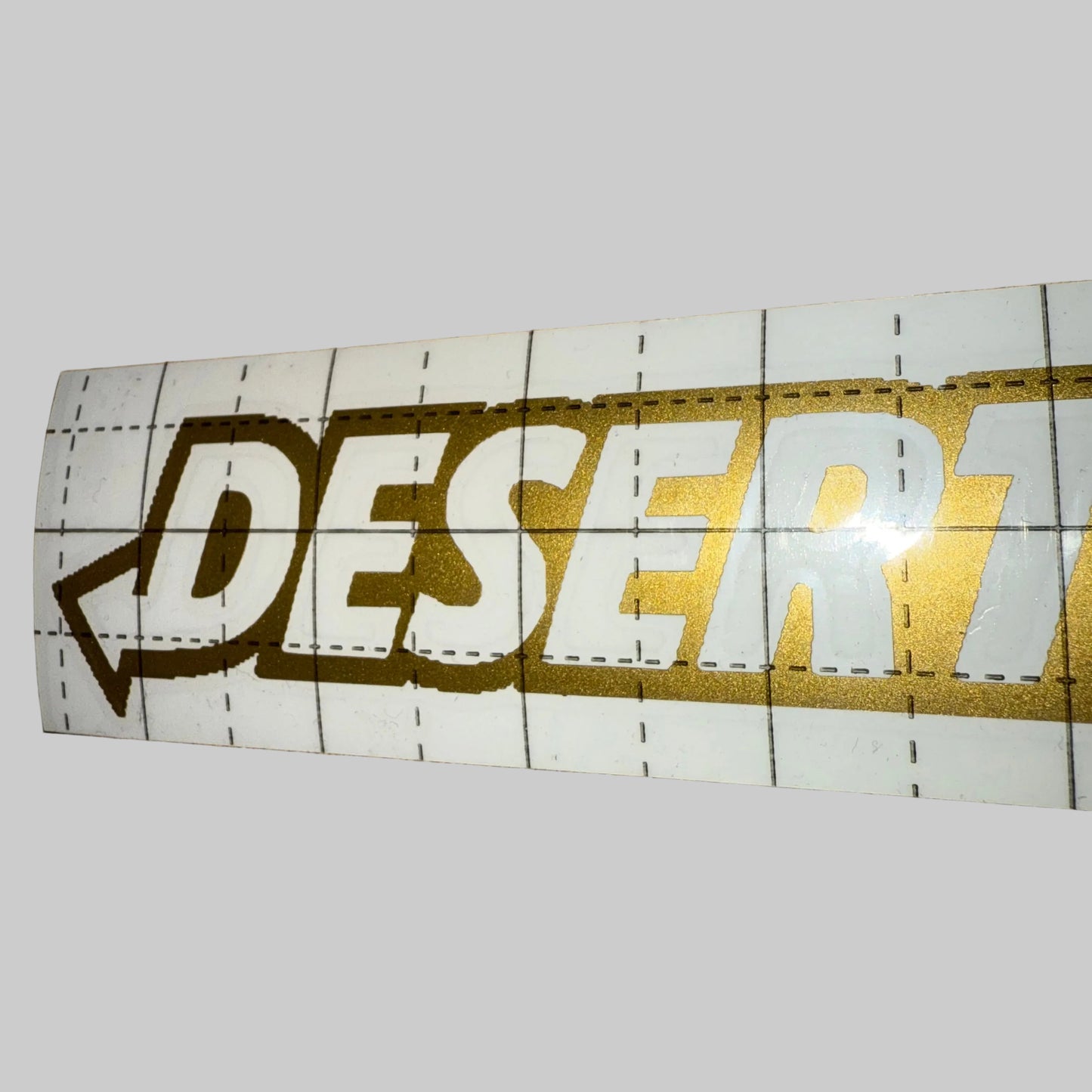 Gold Sparkle Desert Drift Sticker 8”